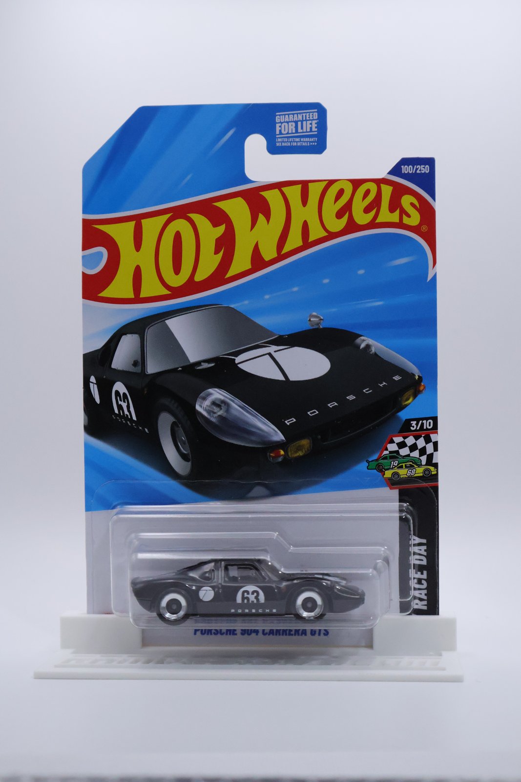 Hot Wheels Porsche 904 Carrera GTS black HW Race Day 1:64 diecast, front of card