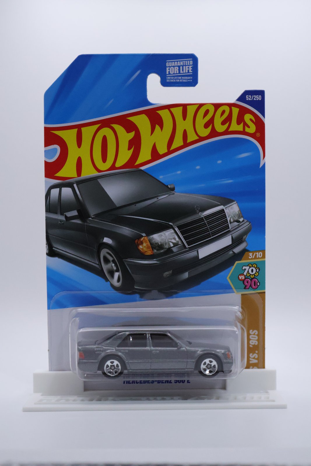 Hot Wheels Mercedes-Benz 500 E gray 70s vs 90s 1:64 diecast, front of card