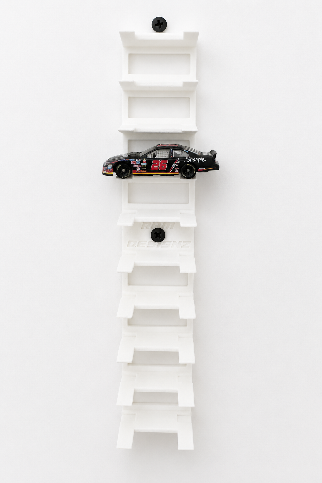 Front view of white 10-car 1/64 scale NASCAR wall display with one diecast car